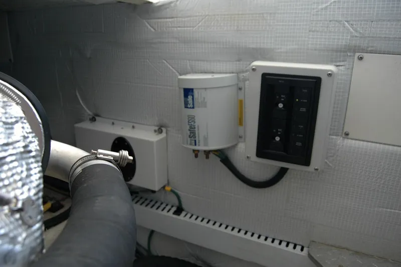 Slide: The Image of Engine room of 2014 Back Cove 37 with fuel filter and control panel. - 124