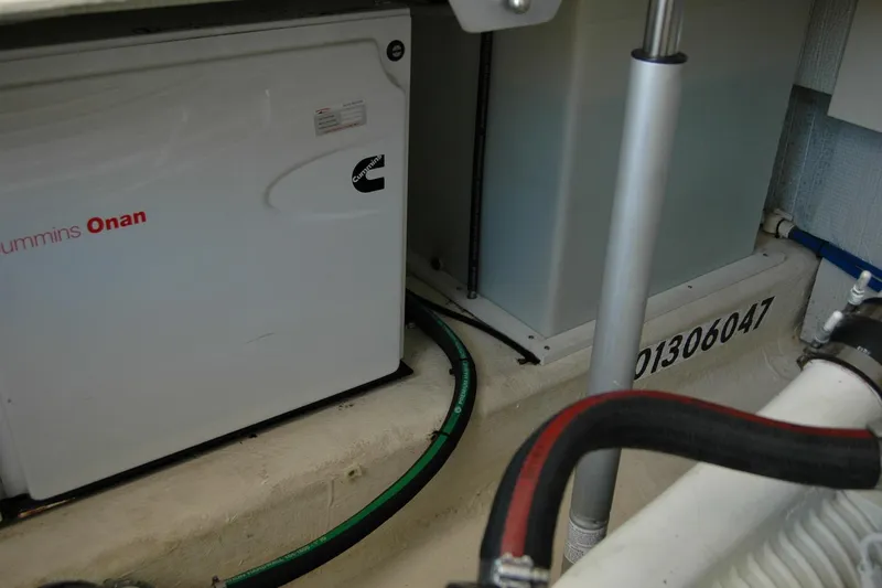 Slide: The Image of Engine room of 2014 Back Cove 37 with Cummins Onan generator. - 127