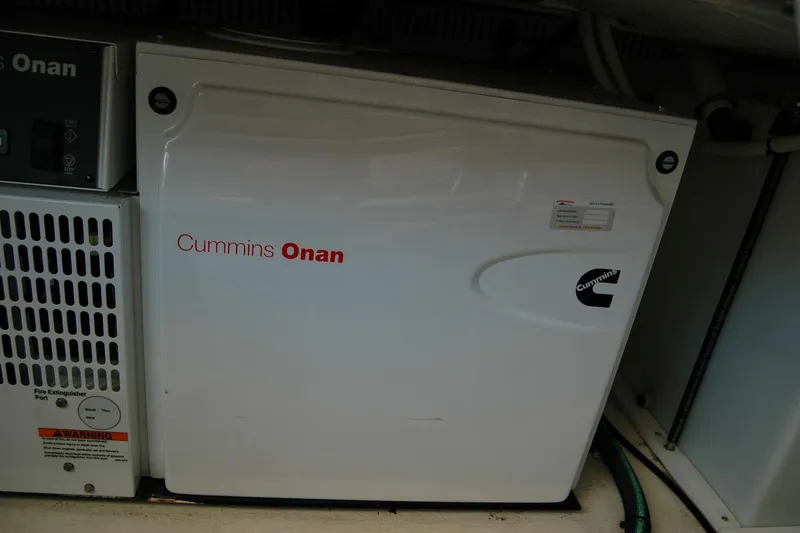 Slide: The Image of Cummins Onan generator in 2014 Back Cove 37 boat engine room. - 128