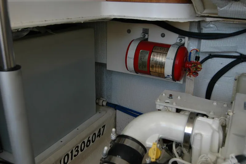 Slide: The Image of Engine room of 2014 Back Cove 37 with fire extinguisher and equipment. - 131