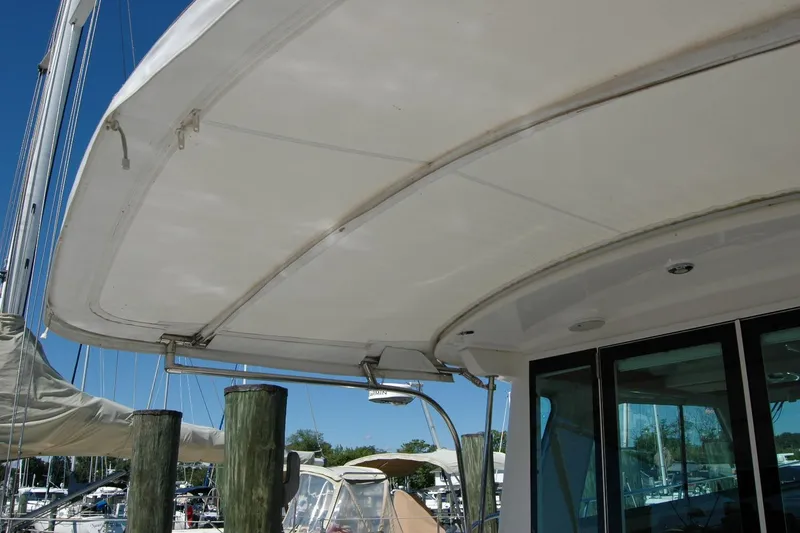 Slide: The Image of 2014 Back Cove 37 yacht with covered deck at marina. - 29