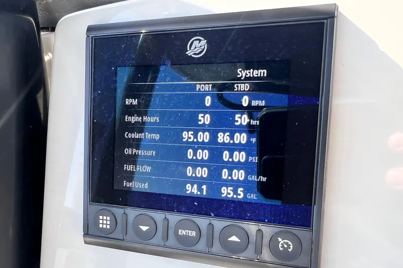 Slide: The Image of Display screen of 2023 Boston Whaler 230 Outrage showing engine system metrics. - 11