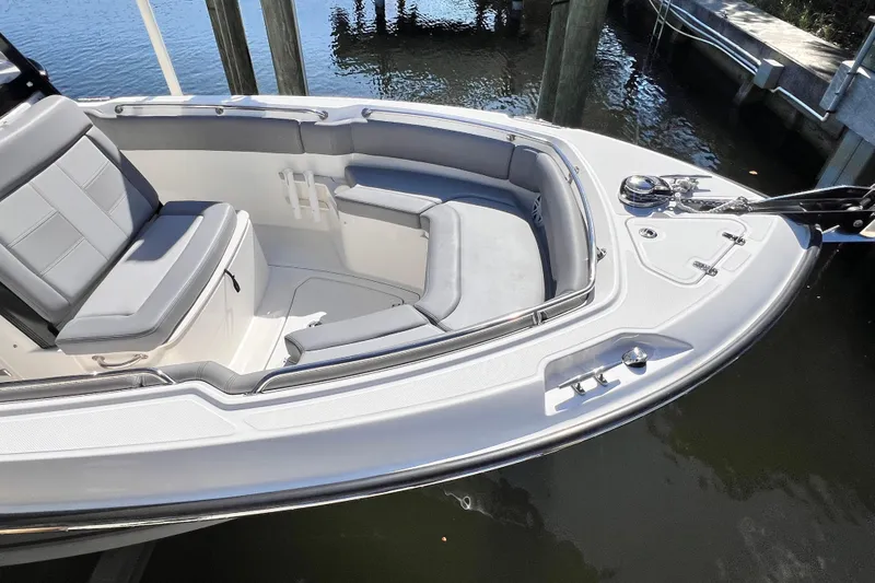 Slide: The Image of 2023 Boston Whaler 230 Outrage boat with sleek seating and modern design. - 17