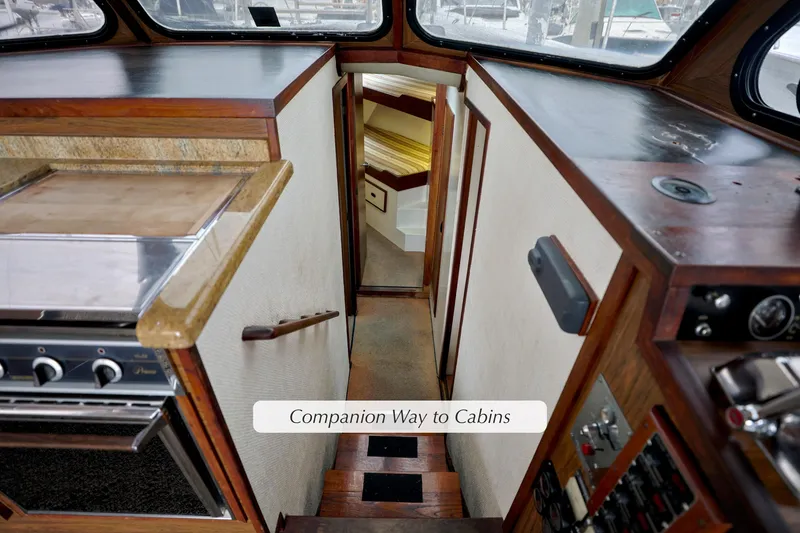 Slide: The Image of Companionway to cabins on 1980 Pacifica 41 Sportfisher boat interior. - 12