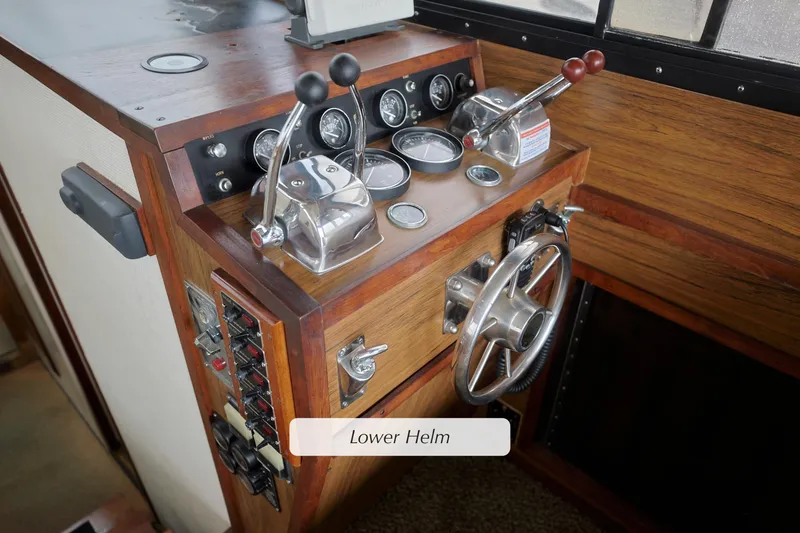Slide: The Image of Lower helm of 1980 Pacifica 41 Sportfisher with wooden finish and control panel. - 9