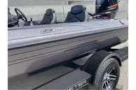 Slide: The Image of 2024 Skeeter ZX150 boat with sleek design and modern features. - 5
