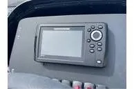 Slide: The Image of 2024 Skeeter ZX150 boat dashboard with electronic display and control buttons. - 6