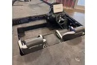 Slide: The Image of Interior view of 2026 Phoenix ZXL Series 721 boat with steering console and seating. - 12