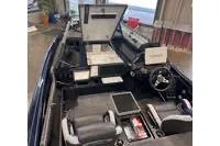 Slide: The Image of 2026 Phoenix ZXL Series 721 boat interior with advanced dashboard and seating. - 16