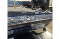 Slide: The Image of Close-up of 2026 Phoenix ZXL Series 721 boat detail with logo. - 3