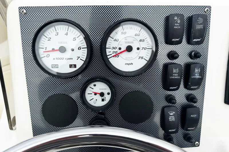Slide: The Image of Dashboard of 2021 Bulls Bay 2200 boat with Yamaha gauges and control switches. - 10