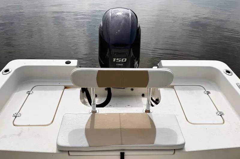Slide: The Image of 2021 Bulls Bay 2200 boat with Yamaha 150 engine on calm water. - 19