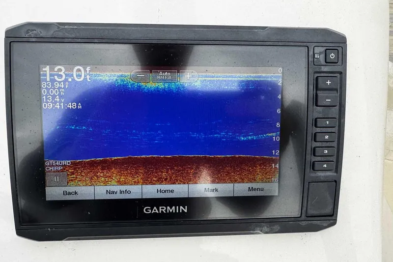 Slide: The Image of Garmin fishfinder display on 2021 Bulls Bay 2200 boat, showing depth and temperature. - 9
