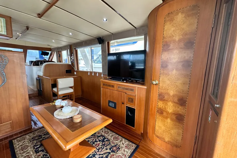 Slide: The Image of Luxurious interior of 2001 Prima 52 Seahorse yacht with wood finishes and modern amenities. - 26