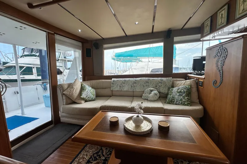 Slide: The Image of Interior of 2001 Prima 52 Seahorse yacht with cozy seating and nautical decor. - 27