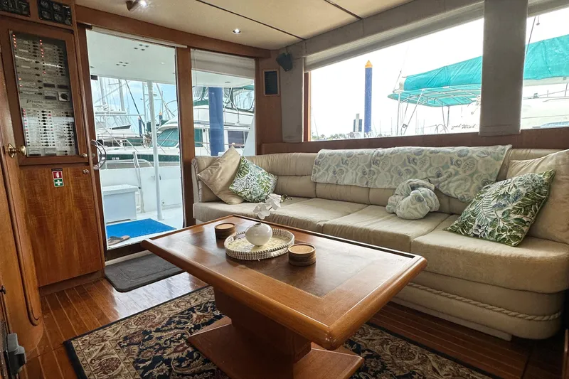 Slide: The Image of Luxurious interior of 2001 Prima 52 Seahorse yacht with plush seating and elegant decor. - 28