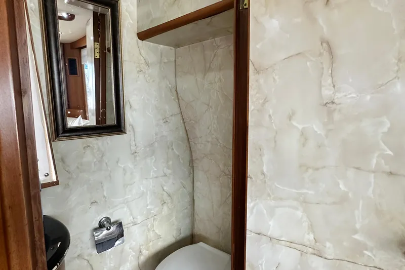 Slide: The Image of Bathroom interior of 2001 Prima 52 Seahorse yacht with marble walls and mirror. - 31