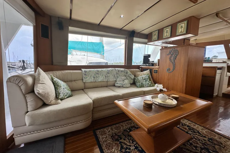 Slide: The Image of Luxurious interior of 2001 Prima 52 Seahorse yacht with elegant seating and nautical decor. - 33