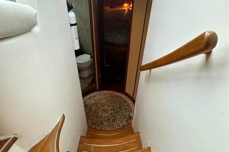 Slide: The Image of Staircase leading to cabin interior on 2001 Prima 52 Seahorse yacht. - 51