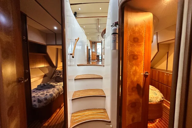 Slide: The Image of Interior of 2001 Prima 52 Seahorse yacht with wooden stairs and cozy cabins. - 63