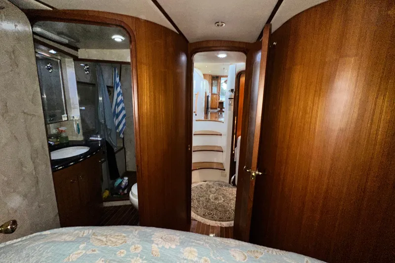 Slide: The Image of Interior of 2001 Prima 52 Seahorse yacht with wooden doors and cozy decor. - 72
