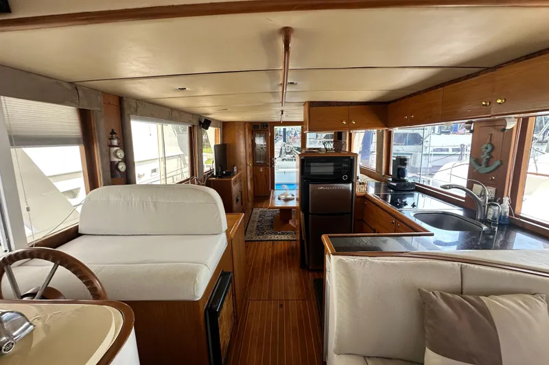 Slide: The Image of Interior of 2001 Prima 52 Seahorse yacht with modern kitchen and seating area. - 79