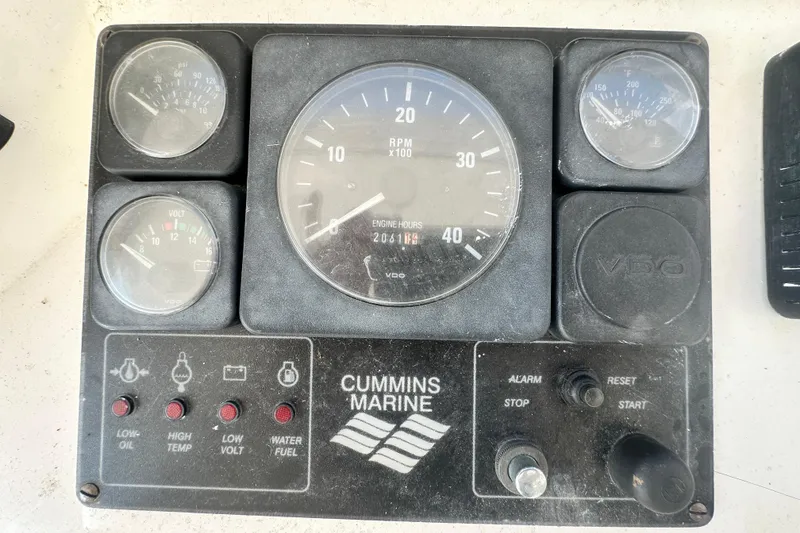 Slide: The Image of Control panel of a 2001 Prima 52 Seahorse boat with Cummins Marine gauges. - 87