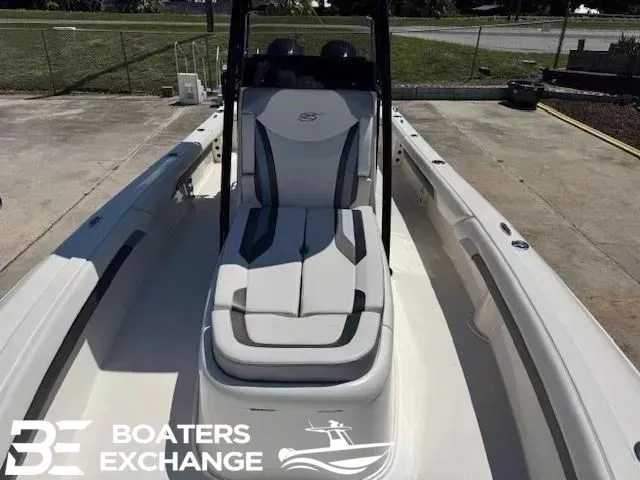 Slide: The Image of 2023 ShearWater 270 SS Carolina boat with engines and seating area. - 11
