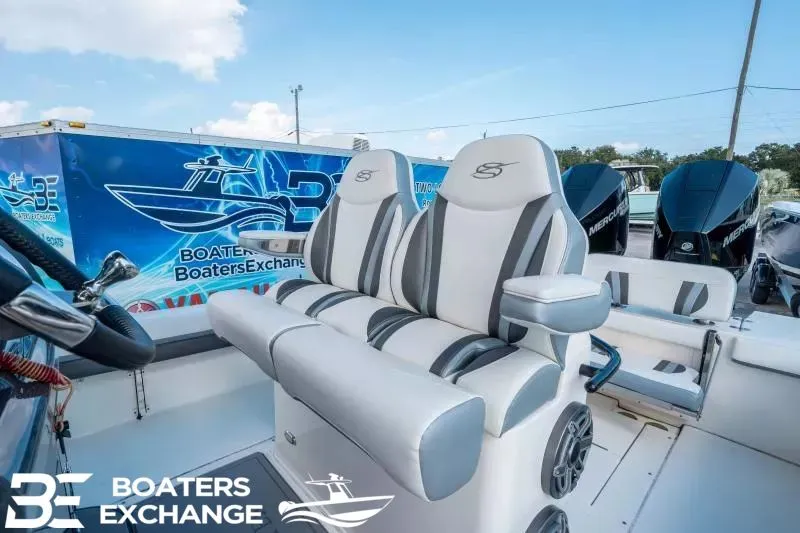 Slide: The Image of 2023 ShearWater 270 SS Carolina boat with luxurious seating. - 15