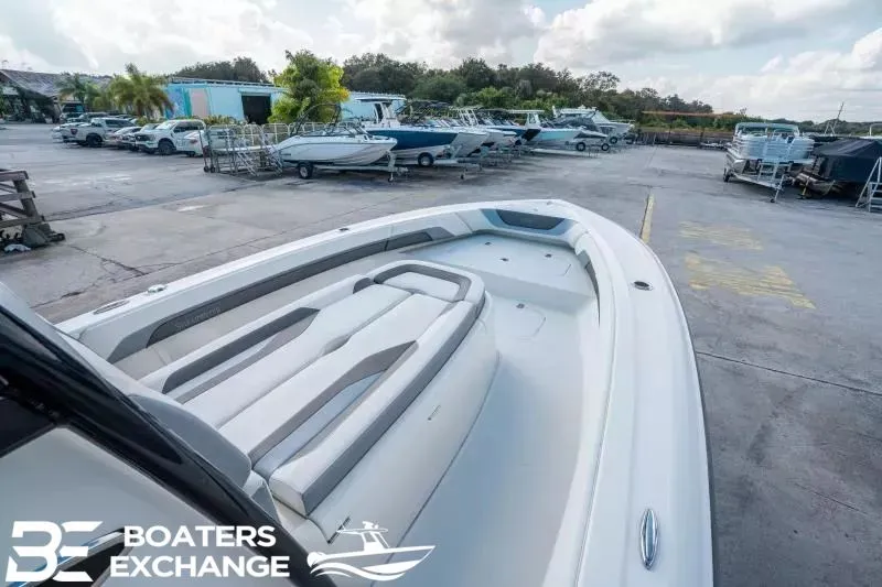 Slide: The Image of 2023 ShearWater 270 SS Carolina boat in a parking lot. - 17