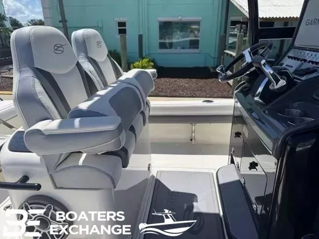 Slide: The Image of 2023 ShearWater 270 SS Carolina boat on trailer. - 7