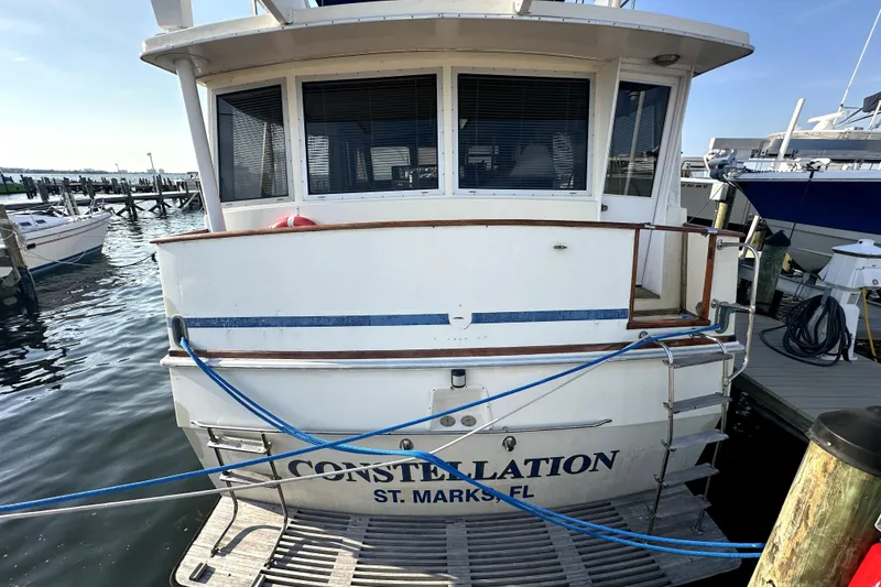 Slide: The Image of 1985 Chris-Craft 500 Constellation yacht docked at marina, St. Marks, FL. - 134