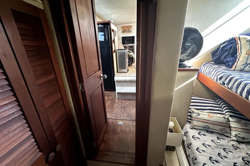 Slide: The Image of Interior of 1985 Chris-Craft 500 Constellation yacht with cozy cabin and nautical decor. - 47