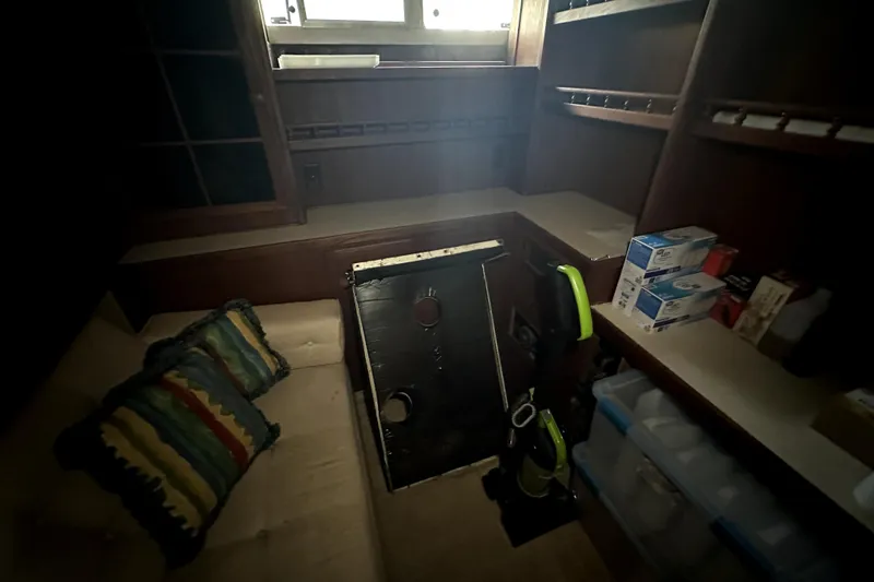 Slide: The Image of Interior of 1985 Chris-Craft 500 Constellation with storage, seating, and supplies. - 56