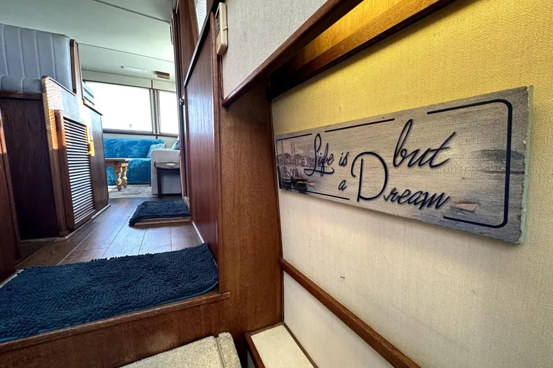 Slide: The Image of Interior of 1985 Chris-Craft 500 Constellation with "Life is but a Dream" sign. - 76