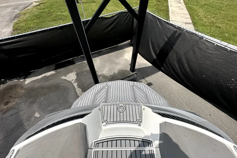 Slide: The Image of 2016 Nautique Super Air Nautique G25 Coastal Edition boat interior with speakers and seating. - 19