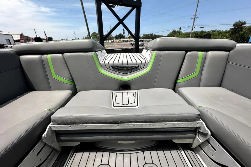 Slide: The Image of 2016 Nautique Super Air Nautique G25 Coastal Edition interior storage compartment with control panel. - 34