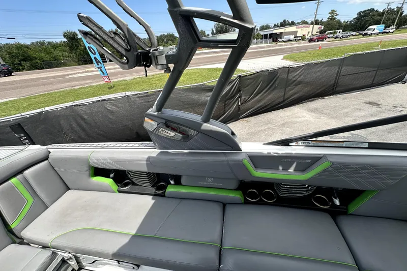 Slide: The Image of 2016 Nautique Super Air Nautique G25 Coastal Edition boat interior, parked near a truck. - 37