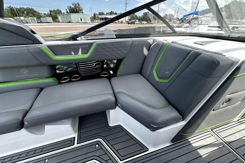 Slide: The Image of 2016 Nautique Super Air Nautique G25 Coastal Edition boat interior, featuring sleek design and seating. - 40