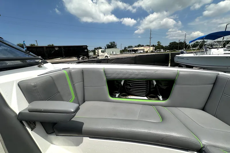 Slide: The Image of 2016 Nautique Super Air Nautique G25 Coastal Edition boat on a lift, top view. - 61