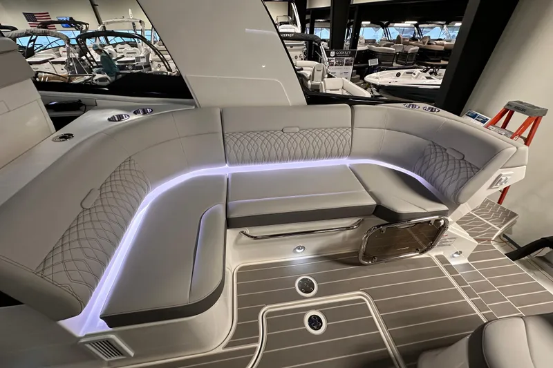 Slide: The Image of 2023 Sea Ray Sundancer 370 Outboard interior with elegant seating and ambient lighting. - 14