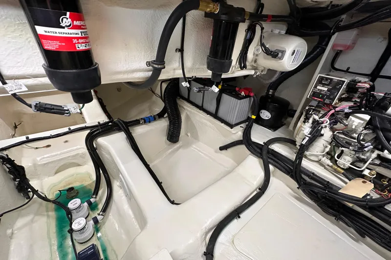 Slide: The Image of Engine compartment of 2023 Sea Ray Sundancer 370 Outboard with fuel and electrical systems. - 17