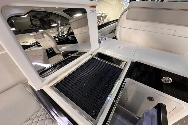 Slide: The Image of 2023 Sea Ray Sundancer 370 Outboard interior with sleek seating and modern amenities. - 21