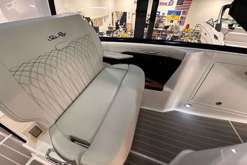 Slide: The Image of 2023 Sea Ray Sundancer 370 Outboard interior with elegant seating and modern design. - 28