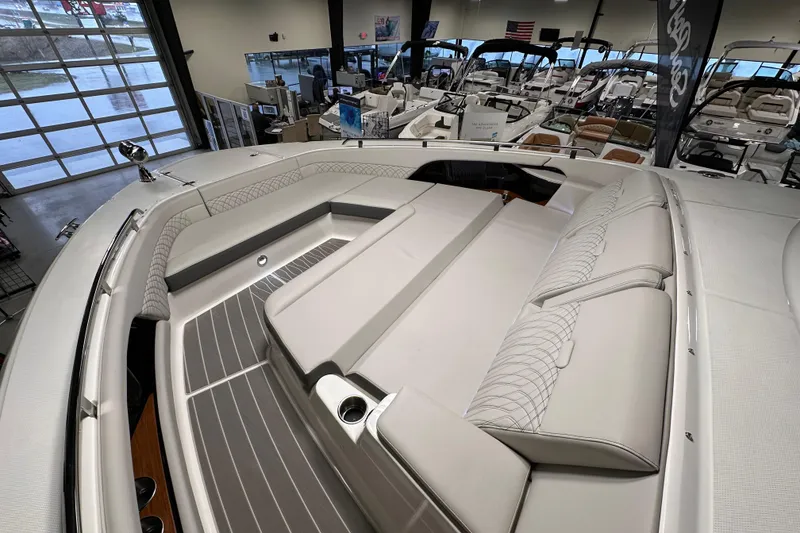 Slide: The Image of 2023 Sea Ray Sundancer 370 Outboard interior with luxurious seating in a showroom. - 32