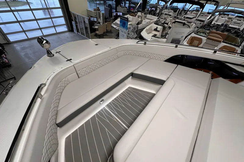 Slide: The Image of 2023 Sea Ray Sundancer 370 Outboard interior with luxurious seating in showroom. - 34