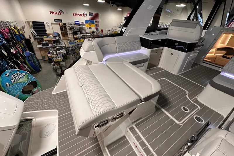 Slide: The Image of 2023 Sea Ray Sundancer 370 Outboard interior with luxurious seating and modern amenities. - 9