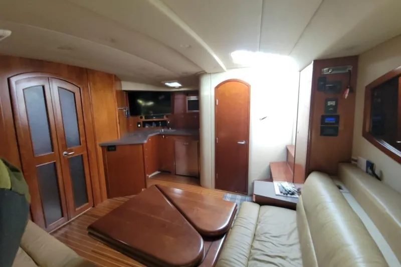 Slide: The Image of Luxurious interior of 2011 Rampage 41 Express yacht with wood finishes and modern amenities. - 10
