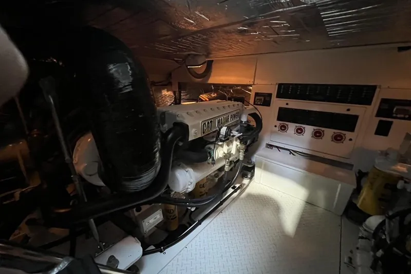 Slide: The Image of Engine room of 2011 Rampage 41 Express boat with CAT marine power engine. - 17