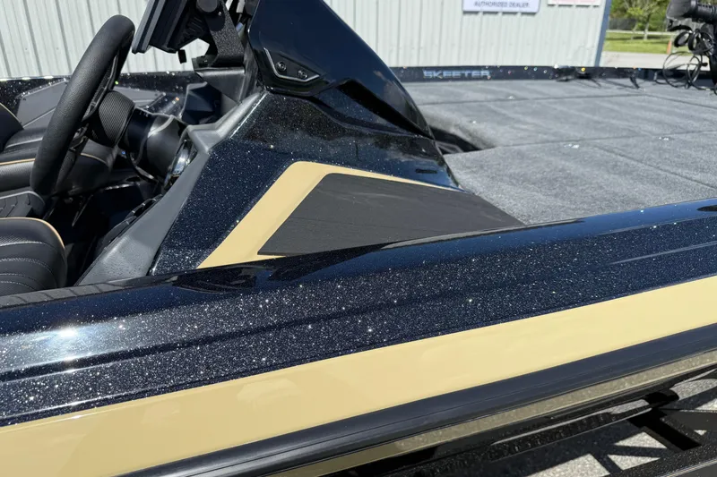 Slide: The Image of 2026 Skeeter ZXE21 boat with sleek design and sparkling finish. - 19
